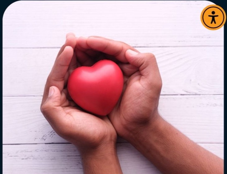 Hands holding heart representing community support